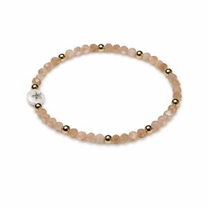 Beige beaded bracelet with starfish charm